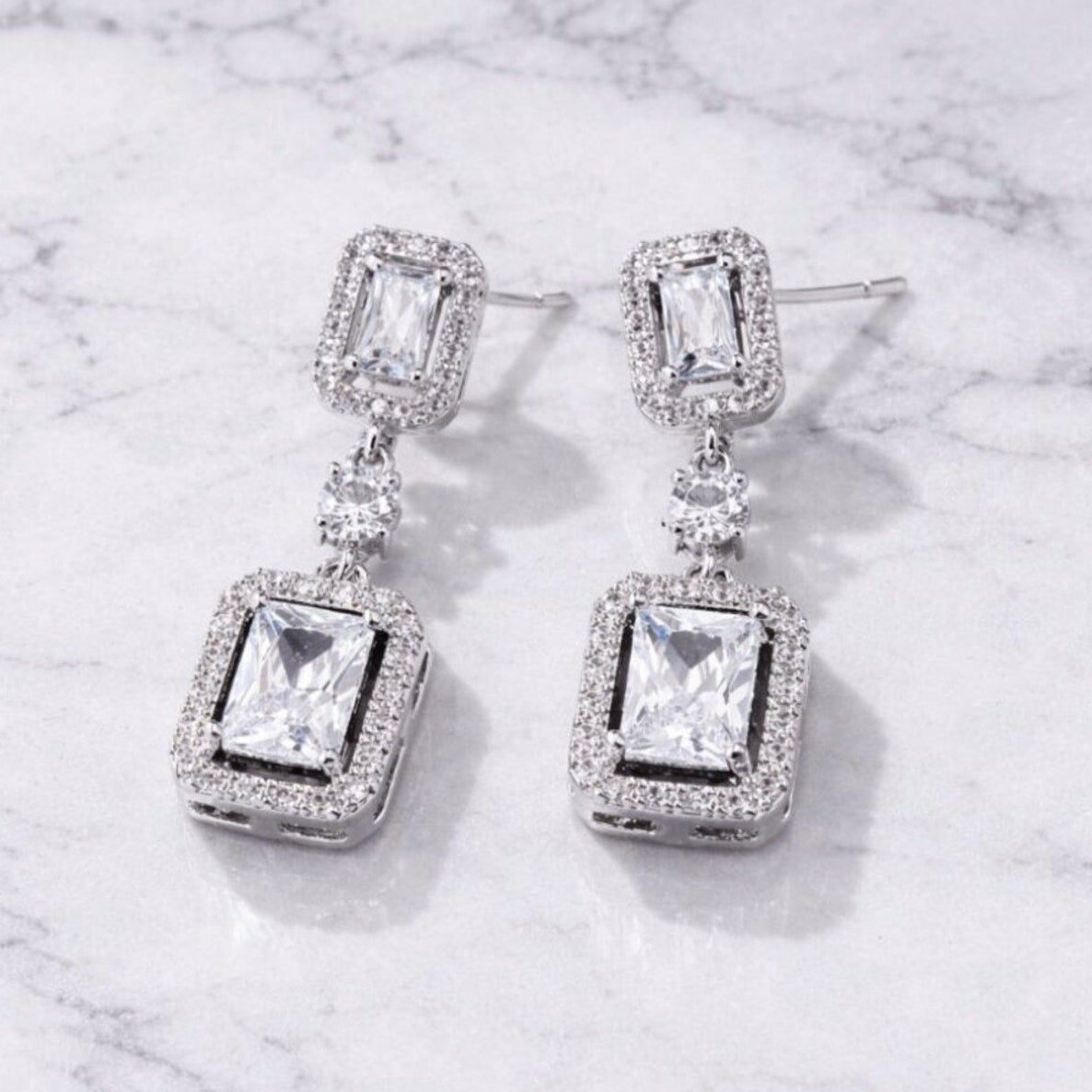 “Enzo” Emerald Cut Drop Earrings – Silver Double Halo Statement Earrings