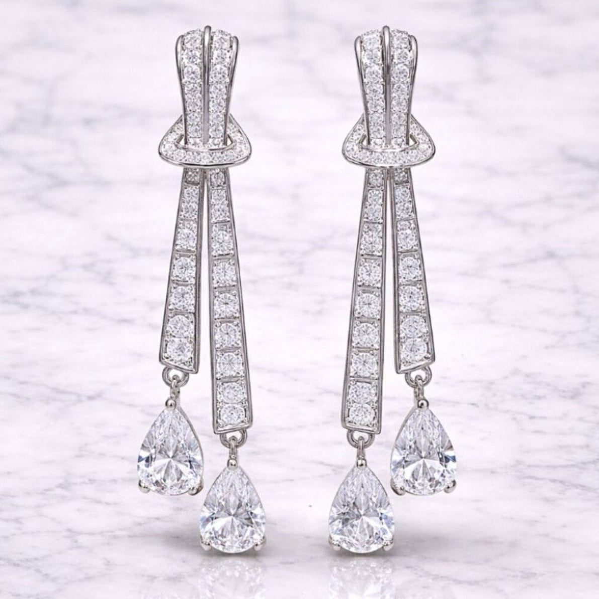 “Renley” Art Deco Drop Earrings – Silver Pavé Bow & Pear Cut Statement Earrings